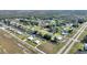 Aerial view of the neighborhood highlighting many canals and waterfront properties at 6365 Avocado Dr, Indian Lake Estates, FL 33855