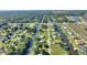 Waterfront community home with canals in backyard, offering scenic views and boating opportunities at 6365 Avocado Dr, Indian Lake Estates, FL 33855