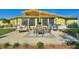 Inviting backyard patio with comfortable seating, ideal for relaxing and enjoying the outdoors at 6365 Avocado Dr, Indian Lake Estates, FL 33855