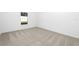 Neutral bedroom with carpet flooring and plenty of natural light at 13283 Tula Loop, Astatula, FL 34705