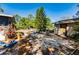Spacious backyard featuring sandy area, mature trees, and an outbuilding at 4290 Trainer Rd, Bartow, FL 33830