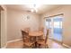 Dining room with chandelier lighting and sliding doors to outside at 4290 Trainer Rd, Bartow, FL 33830