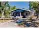 Charming single-story home featuring a screened-in porch and mature trees in a serene neighborhood at 4290 Trainer Rd, Bartow, FL 33830