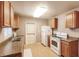 Kitchen features durable countertops, double basin sink and ample storage space at 4290 Trainer Rd, Bartow, FL 33830