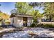 Backyard shed, offering extra storage space or potential workshop area on a sunny day at 4290 Trainer Rd, Bartow, FL 33830