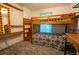 Bedroom features a bunk bed and closet at 4586 Cr 696, Webster, FL 33597