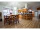 Dining area adjacent to the kitchen with a chandelier and access to outdoor spaces at 4586 Cr 696, Webster, FL 33597