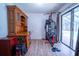 Home gym with hardwood floors and sliding glass doors at 4586 Cr 696, Webster, FL 33597