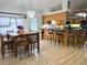 Open floor plan dining area and kitchen featuring a breakfast bar with stool seating at 4586 Cr 696, Webster, FL 33597