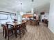 Expansive open layout featuring a kitchen island and dining area, perfect for entertaining at 4586 Cr 696, Webster, FL 33597