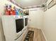 Well-equipped laundry room with modern appliances and ample storage space at 4586 Cr 696, Webster, FL 33597