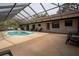 View of the pool area from the far end of the pool showing lounging and play area at 4586 Cr 696, Webster, FL 33597