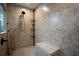 Bright shower with a built-in shower bench and shower caddy at 4586 Cr 696, Webster, FL 33597