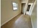 Small room with window and closet with tile floors, good for storage or a room at 5835 Talavera St, Orlando, FL 32807