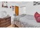 Cozy bedroom features a large window and a built-in closet, great natural light at 1043 Pineview Pl, Lakeland, FL 33801