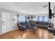 Comfortable living room with neutral paint, wood floors, and comfortable seating at 1043 Pineview Pl, Lakeland, FL 33801