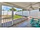 Screened patio with tile floors and a view of the backyard's fenced perimeter at 1043 Pineview Pl, Lakeland, FL 33801