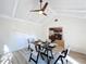 Dining room with decorative ceiling fan and a view of the open kitchen area at 1905 Seminole Trl, Lakeland, FL 33803