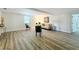 Bright living room featuring neutral paint, wood floors, and contemporary decor at 1905 Seminole Trl, Lakeland, FL 33803