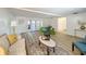 Bright living room showcasing modern decor, stylish furniture, and easy access to outdoor space at 1905 Seminole Trl, Lakeland, FL 33803