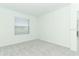 Bright bedroom featuring neutral carpet, fresh paint and a window bringing in light at 2430 Slippery Rock St, Auburndale, FL 33823
