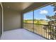 Outdoor balcony offering views of a green area at 8983 Azalea Sands Ln # 8983, Davenport, FL 33896