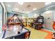 Have fun in this game room with arcade machines, air hockey, and a lively atmosphere at 8983 Azalea Sands Ln # 8983, Davenport, FL 33896