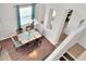 View of the dining area with staircase and kitchen; great home design at 1802 Royal Ridge Dr, Davenport, FL 33896