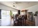 Dining room with ample natural light with a view of the pool at 319 Bailey Cir, Davenport, FL 33897