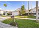 Lovely single-Gathering home with a lush lawn, a mailbox, and mature trees in a serene neighborhood at 319 Bailey Cir, Davenport, FL 33897