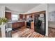Nicely appointed kitchen featuring stainless steel appliances, wood cabinets, and modern finishes at 319 Bailey Cir, Davenport, FL 33897