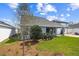 A view of the backyard and covered patio of the new home at 5932 Bristle Oak St, Mount Dora, FL 32757