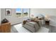 Cozy bedroom with two windows, neutral walls and carpet, and contemporary decor at 5932 Bristle Oak St, Mount Dora, FL 32757