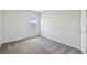 Bedroom with soft carpeting and a bright window at 5932 Bristle Oak St, Mount Dora, FL 32757
