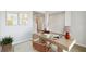 Cozy home office features a stylish desk, comfortable chair and lots of natural light at 5932 Bristle Oak St, Mount Dora, FL 32757