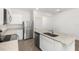 Well-appointed kitchen showcasing stainless steel appliances, granite countertops, and a functional center island at 1633 Nantucket Way, Winter Haven, FL 33884