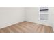 Bedroom featuring neutral carpet, white walls, and a window at 1791 White Elephant Loop, Winter Haven, FL 33884