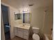 Bathroom featuring a single sink vanity, toilet, and bathtub, designed for functionality and comfort at 3700 Idlebrook Cir # 206, Casselberry, FL 32707