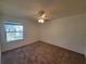 Cozy bedroom with a ceiling fan and natural light, offering a comfortable and inviting atmosphere at 3700 Idlebrook Cir # 206, Casselberry, FL 32707