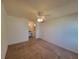 Spacious bedroom with a ceiling fan, carpet and bathroom access, designed for comfort and convenience at 3700 Idlebrook Cir # 206, Casselberry, FL 32707