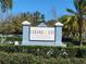 Cabana Key Condominiums sign with lush landscaping and palm trees at 3700 Idlebrook Cir # 206, Casselberry, FL 32707
