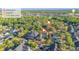 An aerial view showcases the neighborhood with nearby parks and a local middle school at 3930 Cassia Dr, Orlando, FL 32828