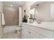 Bathroom with a shower-tub combo and white vanity offering a functional and clean design at 3930 Cassia Dr, Orlando, FL 32828