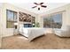 Bright bedroom featuring large windows, ceiling fan, and neutral color scheme for a relaxing atmosphere at 3930 Cassia Dr, Orlando, FL 32828