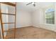 Bedroom featuring a unique loft space, a window seat and plenty of natural light at 3930 Cassia Dr, Orlando, FL 32828