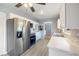 Modern kitchen featuring stainless steel appliances, white cabinets, and new flooring at 1326 Se 34Th Ter, Ocala, FL 34471
