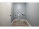 The laundry room features modern flooring and ready for washer and dryer at 1326 Se 34Th Ter, Ocala, FL 34471