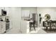 Modern kitchen featuring stainless steel appliances, white cabinets, and a center island with bar seating at 2161 Albatross Nest Dr, Bartow, FL 33830