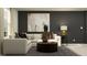Inviting living room features stylish sofa, contemporary art, elegant lamp, and a comfortable gathering space at 2161 Albatross Nest Dr, Bartow, FL 33830