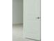 Clean bedroom with painted white walls and flooring at 2411 Slippery Rock St, Auburndale, FL 33823
